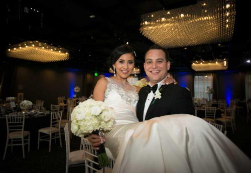 bride-groom-photo-groom-holding-bride-inside-glendale-event-venue