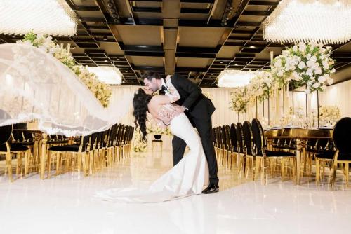 HD-picture-wedding-couple-posing-inside-black-banquet-venue-inside-vertigo-event-venue-los-angeles